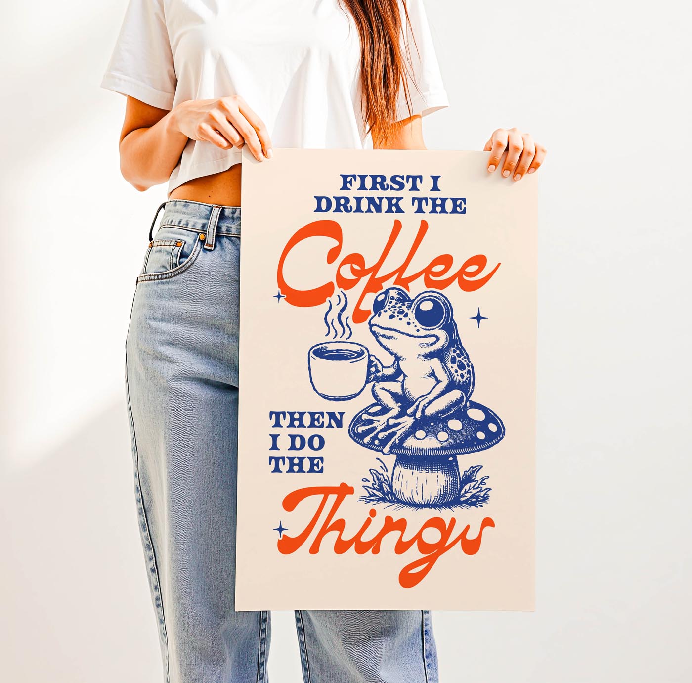 Whimsical “First I Drink the Coffee Then I Do the Things” print featuring a cute frog with a coffee cup sitting on a toadstool—perfect cozy cottagecore wall art for coffee lovers.