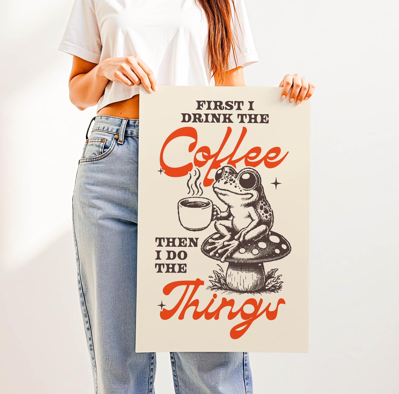 Whimsical “First I Drink the Coffee Then I Do the Things” print featuring a cute frog with a coffee cup sitting on a toadstool—perfect cozy cottagecore wall art for coffee lovers.