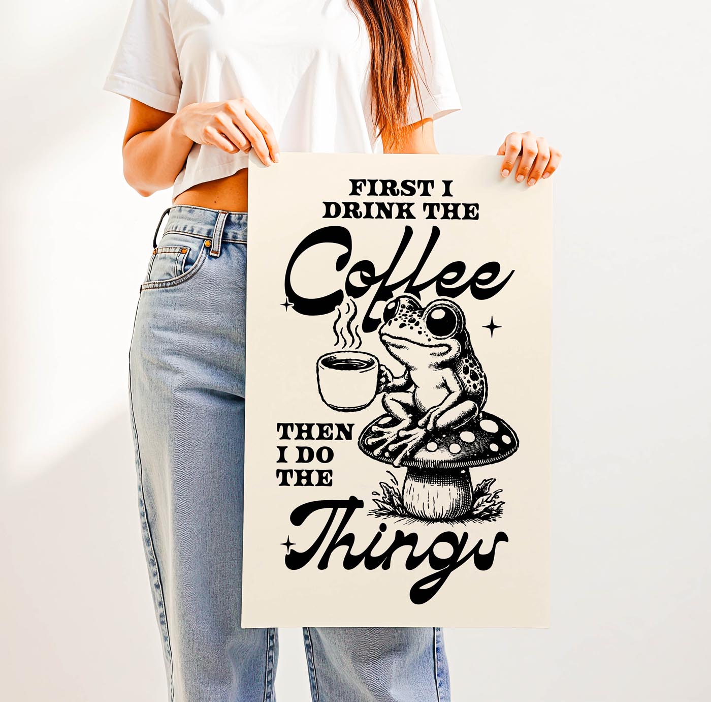 Whimsical “First I Drink the Coffee Then I Do the Things” print featuring a cute frog with a coffee cup sitting on a toadstool—perfect cozy cottagecore wall art for coffee lovers.