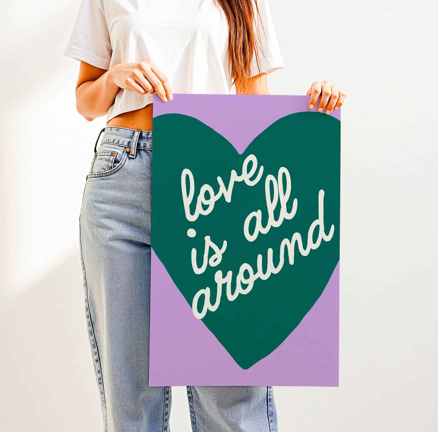Whimsical “Love Is All Around” wall art with playful handwritten font and hand-drawn heart—feel-good print for nurseries, bedrooms, or cozy spaces.