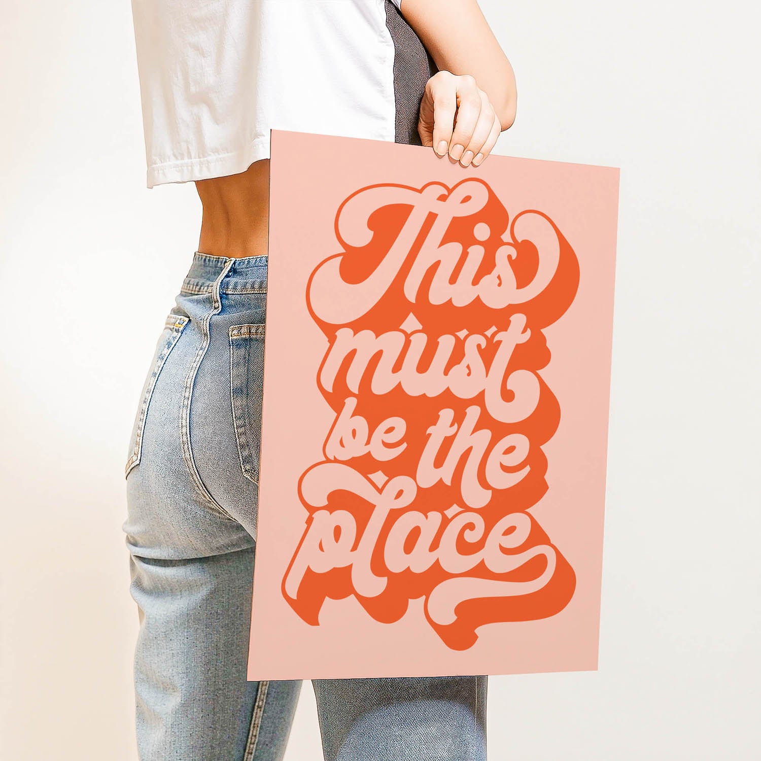 Best-selling 70s retro typography wall art print that says “This Must Be the Place” – perfect for gallery walls, entryways, or aesthetic home decor.