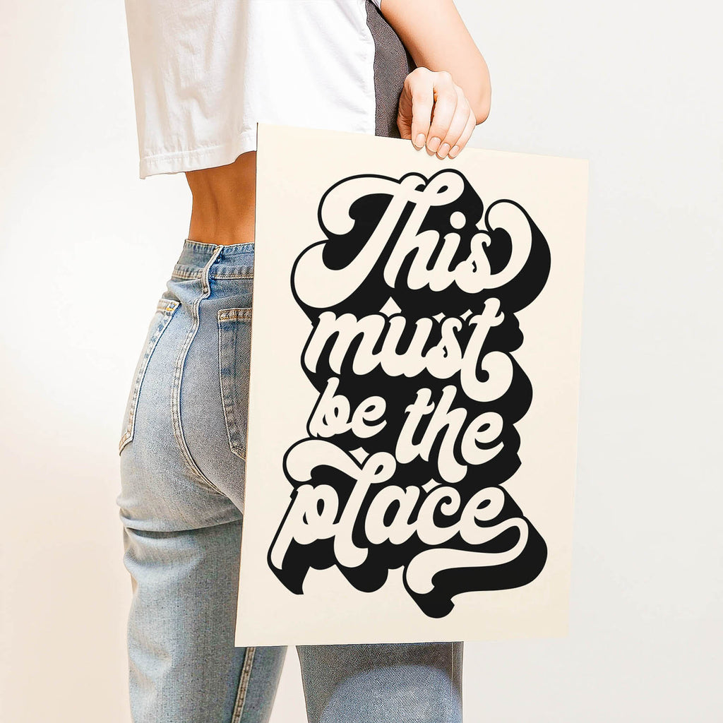 Best-selling 70s retro typography wall art print that says “This Must Be the Place” – perfect for gallery walls, entryways, or aesthetic home decor.